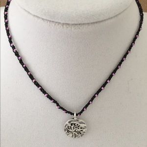 Beaded choker necklace with lotus pendant